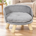 Panier canapé scandinave pour chien et chat dans un salon