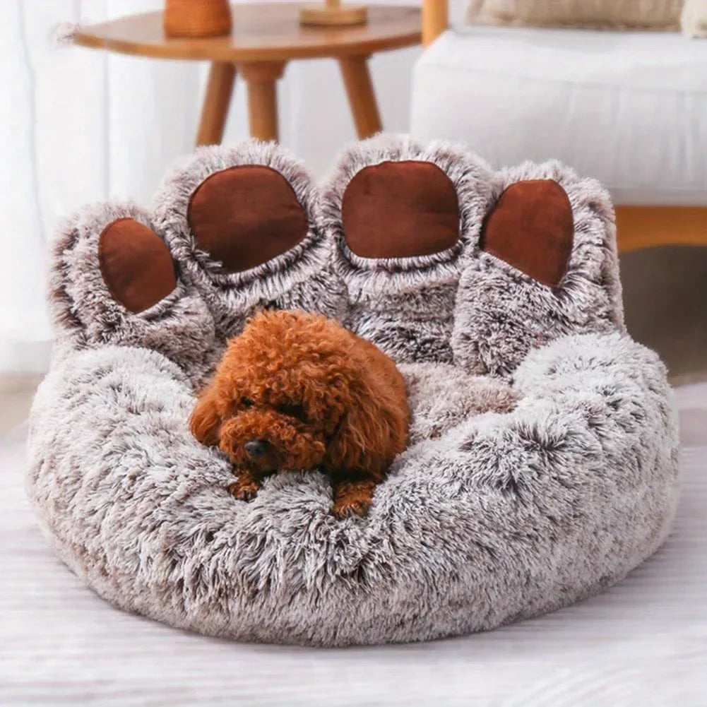 Chien dans le coussin respirant en forme de patte