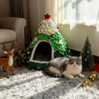 Niche sapin de Noël avec un chat